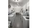 Well-equipped laundry room with multiple washing machines, providing convenience at 2460 Persian Dr # 44, Clearwater, FL 33763