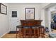 Interior bar area featuring a wooden bar, seating for four, and a decorative atmosphere at 2518 Keen Park Dr, Largo, FL 33771