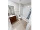 Bathroom featuring a vanity with granite countertop and a shower over tub at 3926 Cat Mint St, Tampa, FL 33619