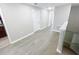 Upstairs hallway with wood floors at 3926 Cat Mint St, Tampa, FL 33619