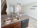 Modern kitchen with granite countertops, stainless steel appliances, and tile flooring at 3926 Cat Mint St, Tampa, FL 33619