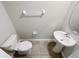 Clean powder room with pedestal sink, and tile floors at 3926 Cat Mint St, Tampa, FL 33619