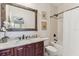 Stylish bedroom with bunk beds, a comfortable sitting area, and a ceiling fan, perfect for relaxation at 4012 W Obispo St, Tampa, FL 33629