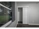 This bedroom offers modern flooring, neutral paint, a window, and a closet at 5018 Pine St, Seffner, FL 33584