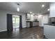 Modern kitchen with sleek countertops, stainless steel appliances, and stylish gray cabinetry at 5018 Pine St, Seffner, FL 33584