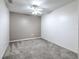 Bedroom featuring a ceiling fan, neutral walls, and carpet at 6332 Timberly Ln, Zephyrhills, FL 33542