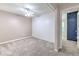 Bedroom with a ceiling fan, neutral walls, and open doorway at 6332 Timberly Ln, Zephyrhills, FL 33542