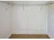 Walk-in closet featuring basic wire shelving at 8402 Roxboro Dr, Hudson, FL 34667
