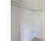 Walk in closet featuring coated wire shelving at 8402 Roxboro Dr, Hudson, FL 34667