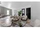 Inviting dining area features a glass table setting and stylish decor at 8402 Roxboro Dr, Hudson, FL 34667