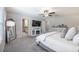 Spacious bedroom with a walk-in closet, neutral colors, and a view into the bathroom at 10270 Shady Preserve Dr, Riverview, FL 33578