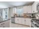 Charming kitchen featuring stainless steel appliances and granite countertops at 10270 Shady Preserve Dr, Riverview, FL 33578