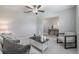Cozy living room with neutral color palette and comfortable seating arrangements, creating a relaxed atmosphere at 10270 Shady Preserve Dr, Riverview, FL 33578