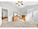 Bright bedroom with natural light, vaulted ceiling, and two dressers at 10813 Rockledge View Dr., Riverview, FL 33579