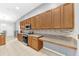 Bright, updated kitchen with granite countertops, stainless steel appliances, and plenty of cabinet space at 10813 Rockledge View Dr., Riverview, FL 33579