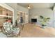 Inviting lanai with brick floors, ceiling fan, and comfortable seating, creating a cozy outdoor space at 10813 Rockledge View Dr., Riverview, FL 33579