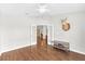Versatile office space with hardwood floors, French doors, and a mounted deer head adding character at 10813 Rockledge View Dr., Riverview, FL 33579