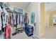Walk-in closet with ample hanging space and shelving, providing organized storage solutions at 10813 Rockledge View Dr., Riverview, FL 33579
