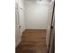 Empty bedroom features laminate flooring and a closet at 12216 Southbridge Ter, Hudson, FL 34669
