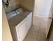 Laundry room with a washer and dryer at 12216 Southbridge Ter, Hudson, FL 34669