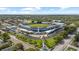 Aerial view of the baseball field with a grandstand, green field, and surrounding city skyline at 1222 Palm St, Clearwater, FL 33755