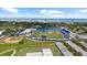 Aerial view of the baseball field with a grandstand and practice baseball field near a large body of water at 1222 Palm St, Clearwater, FL 33755