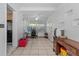 Bright sunroom featuring tile flooring, a ceiling fan, and lots of natural light at 1222 Palm St, Clearwater, FL 33755