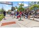 Town market scene with a live band consisting of bagpipes and drums with plenty of spectators at 1222 Palm St, Clearwater, FL 33755
