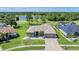 A great aerial view of the home and surrounding landscaping and golf course at 12910 Prestwick Dr, Riverview, FL 33579