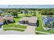 A great aerial view of the home with golf course and water views at 12910 Prestwick Dr, Riverview, FL 33579