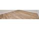 Close-up of stylish light wood flooring, enhancing the home's aesthetic and providing a warm ambiance at 12910 Prestwick Dr, Riverview, FL 33579