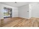Open-concept living space with sliding glass doors overlooking the pool and backyard at 12910 Prestwick Dr, Riverview, FL 33579