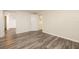 Finished basement with vinyl flooring and doorway to another room at 1600 Lonesome Pine Ln, Tarpon Springs, FL 34689