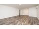 Finished basement with vinyl flooring, recessed lights, and closet at 1600 Lonesome Pine Ln, Tarpon Springs, FL 34689