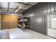 Clean and organized workshop interior with shelving and ample storage space at 1600 Lonesome Pine Ln, Tarpon Springs, FL 34689