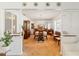 Elegant dining room featuring a chandelier, mirrored wall, and classic furniture at 16113 Tampa St, Lutz, FL 33548