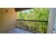 Relaxing balcony space surrounded by lush greenery and privacy at 16501 Harper Pond Ln # 308, Odessa, FL 33556