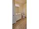 Bathroom featuring tiled floors, a single sink vanity, and a toilet at 16501 Harper Pond Ln # 308, Odessa, FL 33556