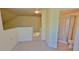 Bonus room leading up to the third floor with a full bathroom and shower at 16501 Harper Pond Ln # 308, Odessa, FL 33556