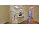 Beautiful kitchen with breakfast bar, ample cabinet space, and modern appliances at 16501 Harper Pond Ln # 308, Odessa, FL 33556