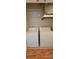 Convenient laundry area with washer, dryer, and storage shelves at 16501 Harper Pond Ln # 308, Odessa, FL 33556