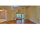 Spacious open floor plan features a spiral staircase, high ceilings, and ample natural light at 16501 Harper Pond Ln # 308, Odessa, FL 33556