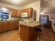 Well-equipped kitchen with granite countertops, and center island at 1710 7Th Sw St # 39, Ruskin, FL 33570