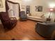 Comfortable living room features hardwood floors and comfortable seating arrangement at 1710 7Th Sw St # 39, Ruskin, FL 33570