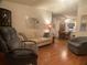 Inviting living room with wood floors and an open layout leading to the dining area at 1710 7Th Sw St # 39, Ruskin, FL 33570