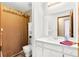 This bathroom features a shower/tub combination and a vanity at 17207 Bosley Dr, Spring Hill, FL 34610