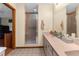 Bright bathroom with walk-in shower, single vanity, and ample counter space at 17207 Bosley Dr, Spring Hill, FL 34610