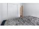 Bedroom features a closet and doorway, offering storage and access to other areas at 17207 Bosley Dr, Spring Hill, FL 34610