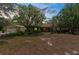 Charming single-story home with mature trees and lush landscaping in a serene setting at 17207 Bosley Dr, Spring Hill, FL 34610