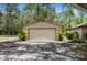 Spacious detached garage with ample parking space and potential for storage or a workshop at 17207 Bosley Dr, Spring Hill, FL 34610